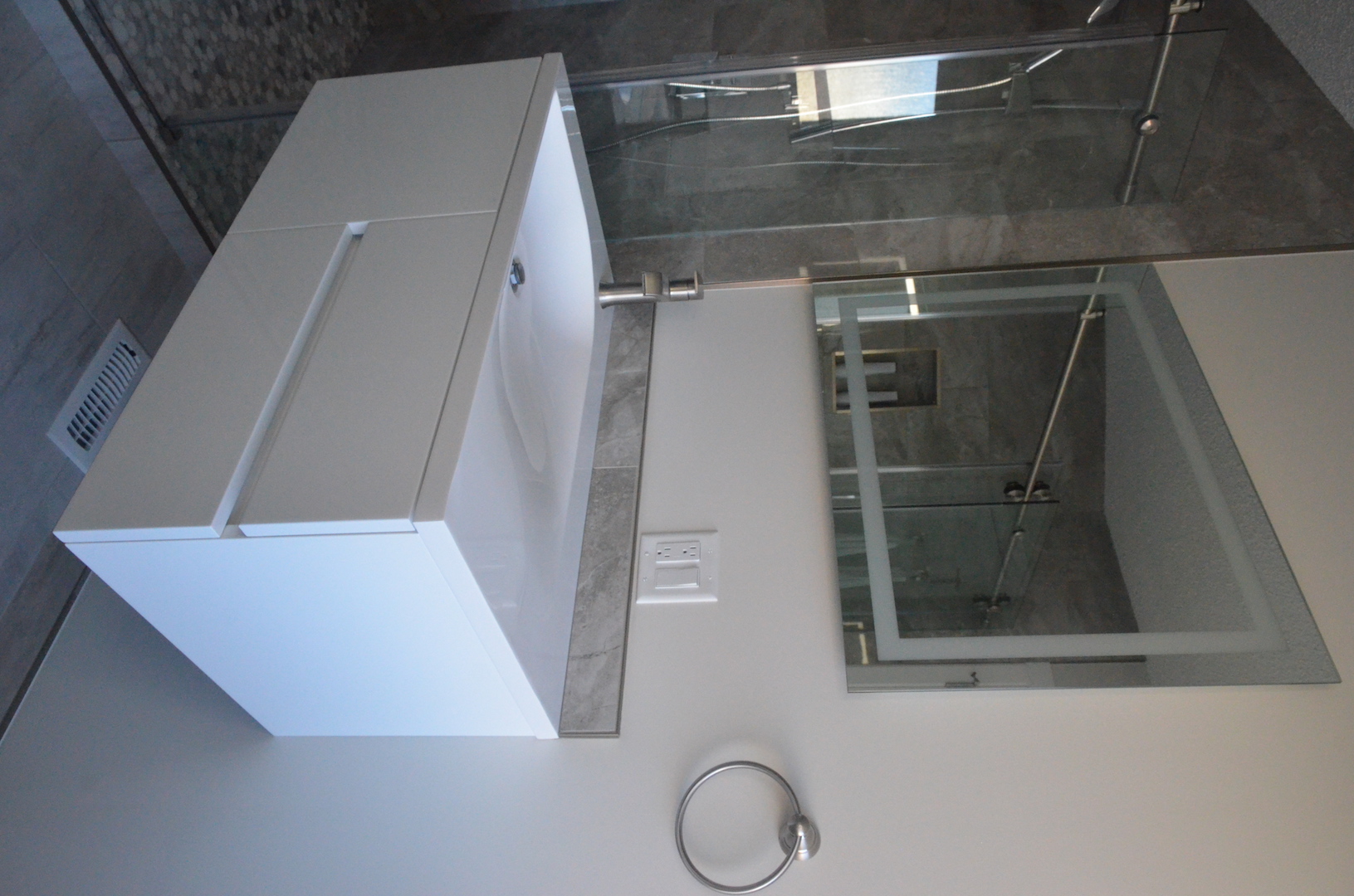 Bright bathroom with lighted mirror